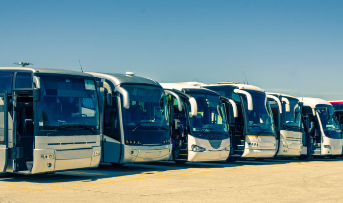 parking lot full of eco-friendly public transportation buses, can this be our future public transportation