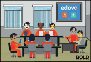 Educational programs for prisoners: Prisoners in jump suits learning.