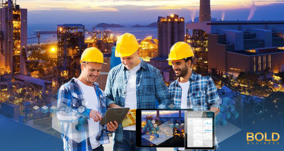 Men in hardhats consulting digital data