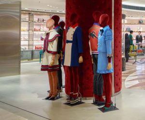 Mannequin Wears Famous Gucci's trademark stripes clothing line