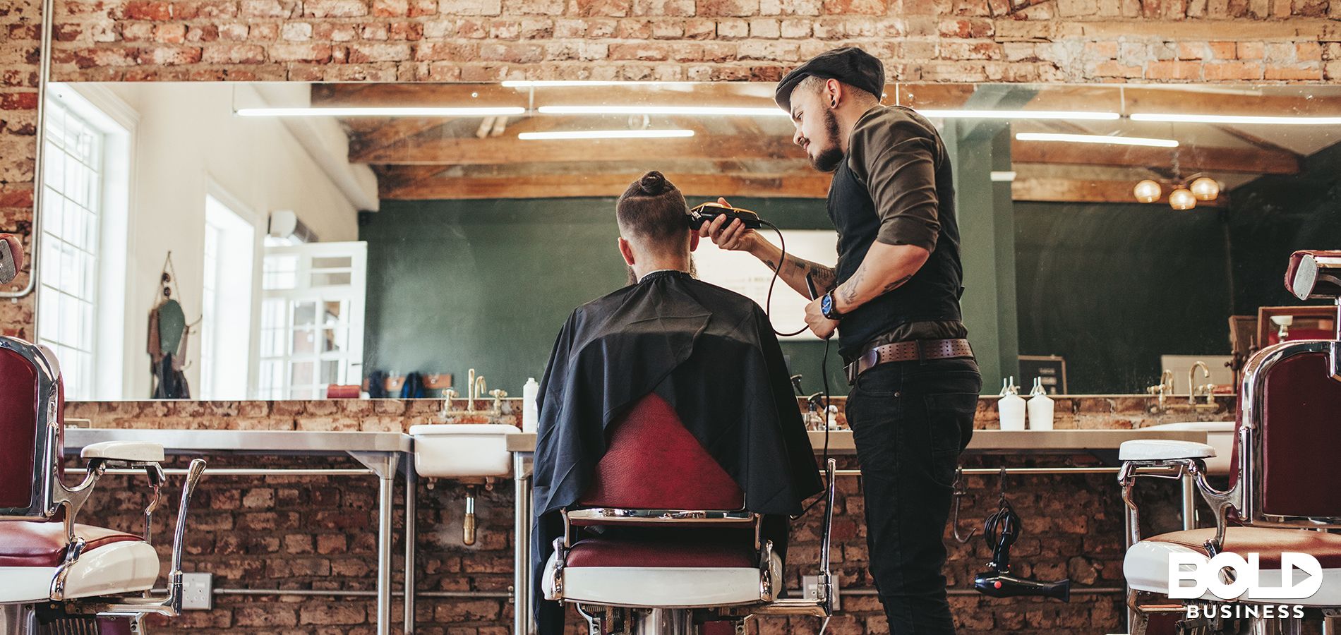 a photo of a barber shaving the head of a man's head inside a stylish barber shop while scientists discover a stem cell hair growth cure