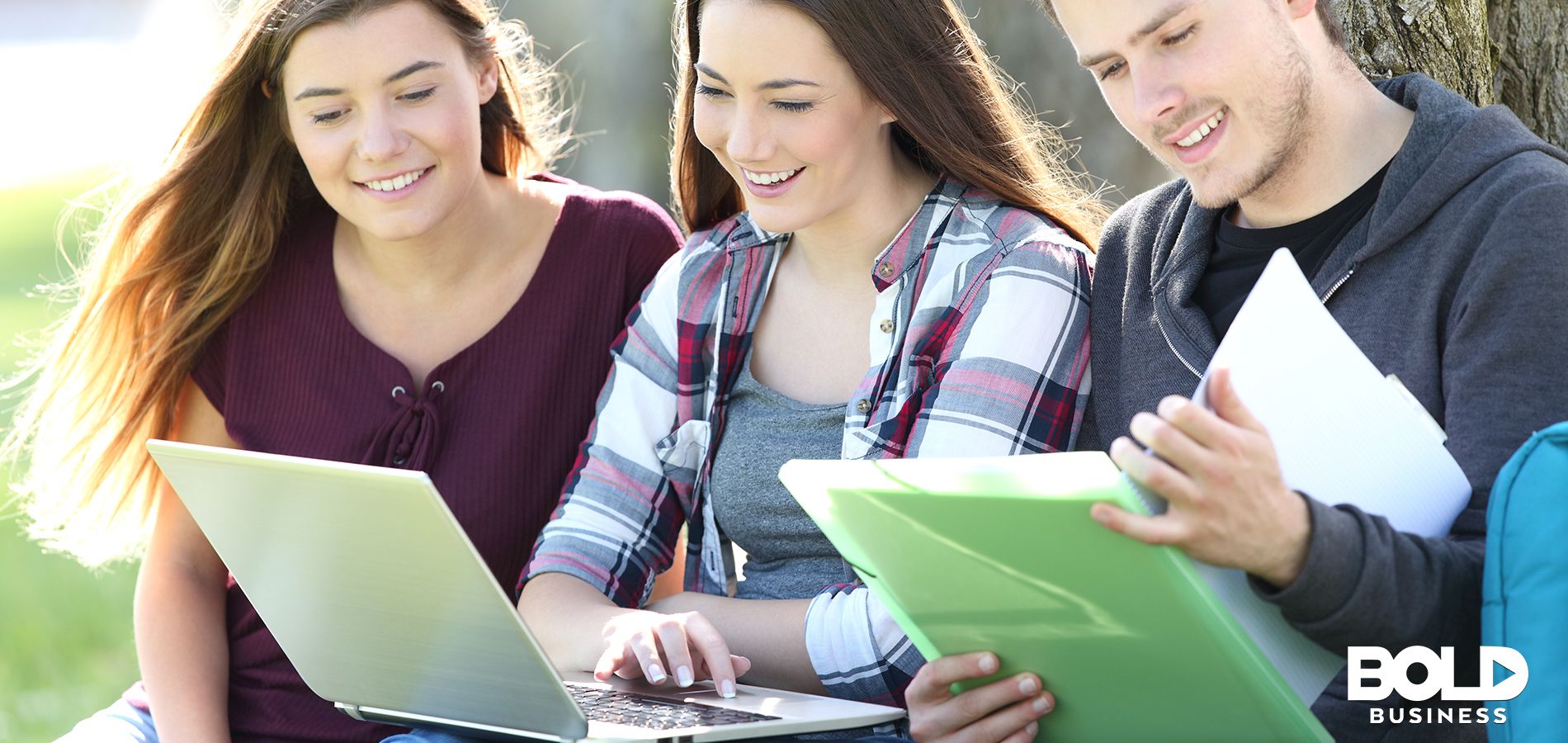 Three students study with Apps As Part of College Education Software