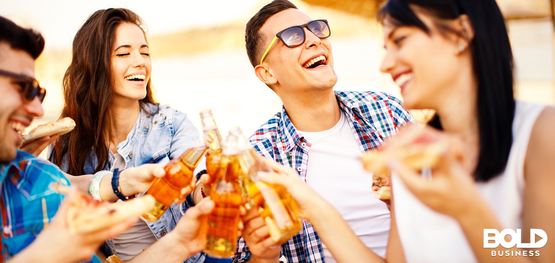 People enjoying drinks at the beach.