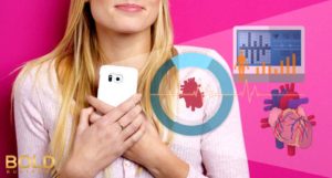 Woman with heart health monitor app.
