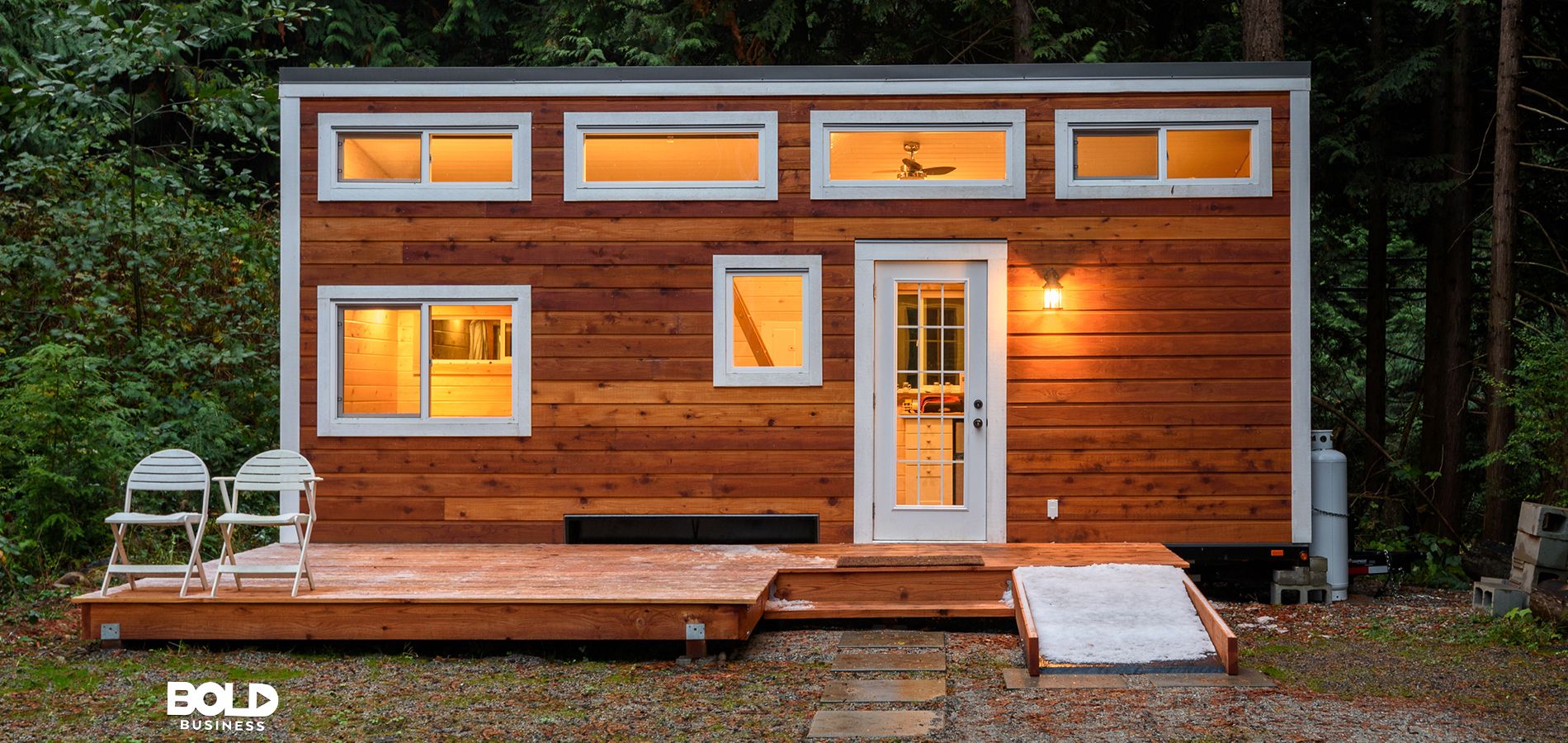 Small wooden cabin house in the evening