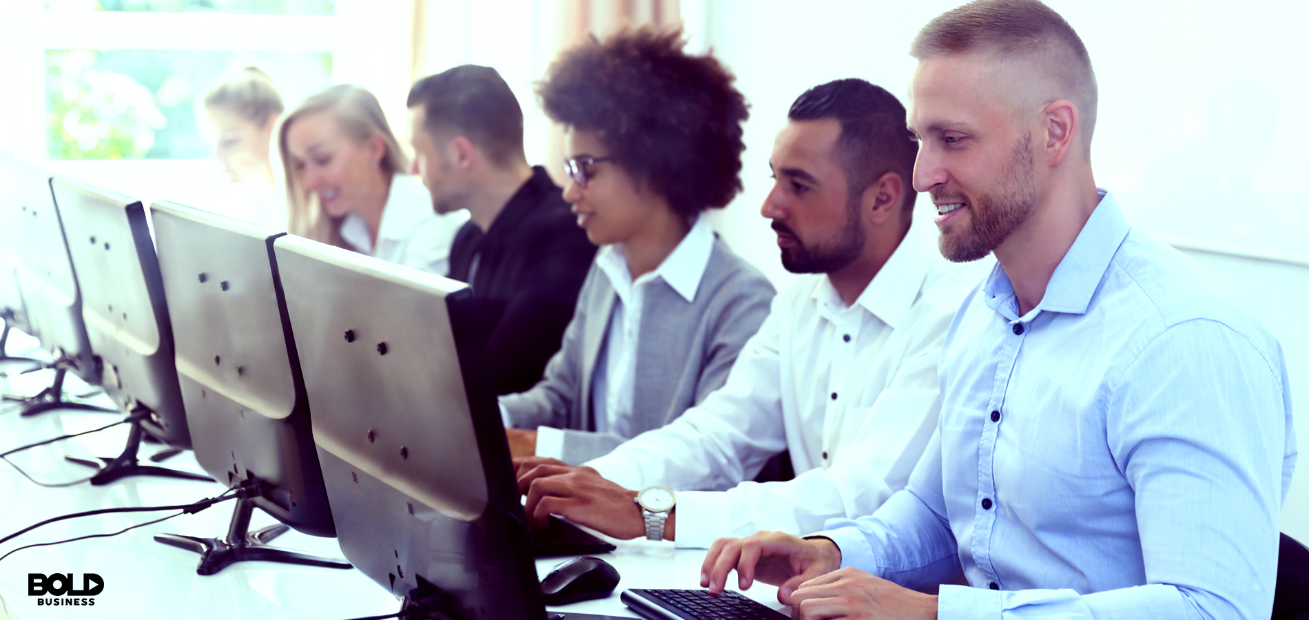 A group of professionals on computers