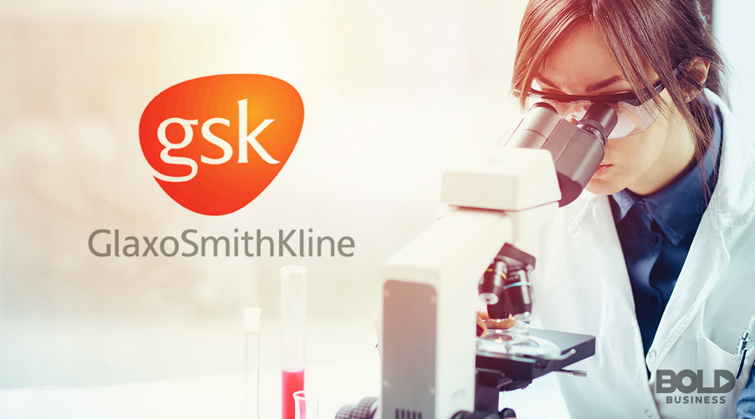 a GSK employee looking into a microscope amid Anti-Aging Startups Leading the Longevity Research Revolution