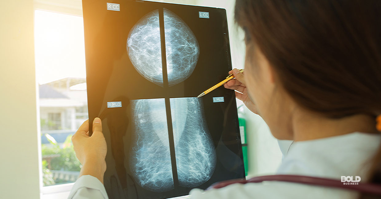 new cancer medication, mammogram a doctor looking at a mammogram