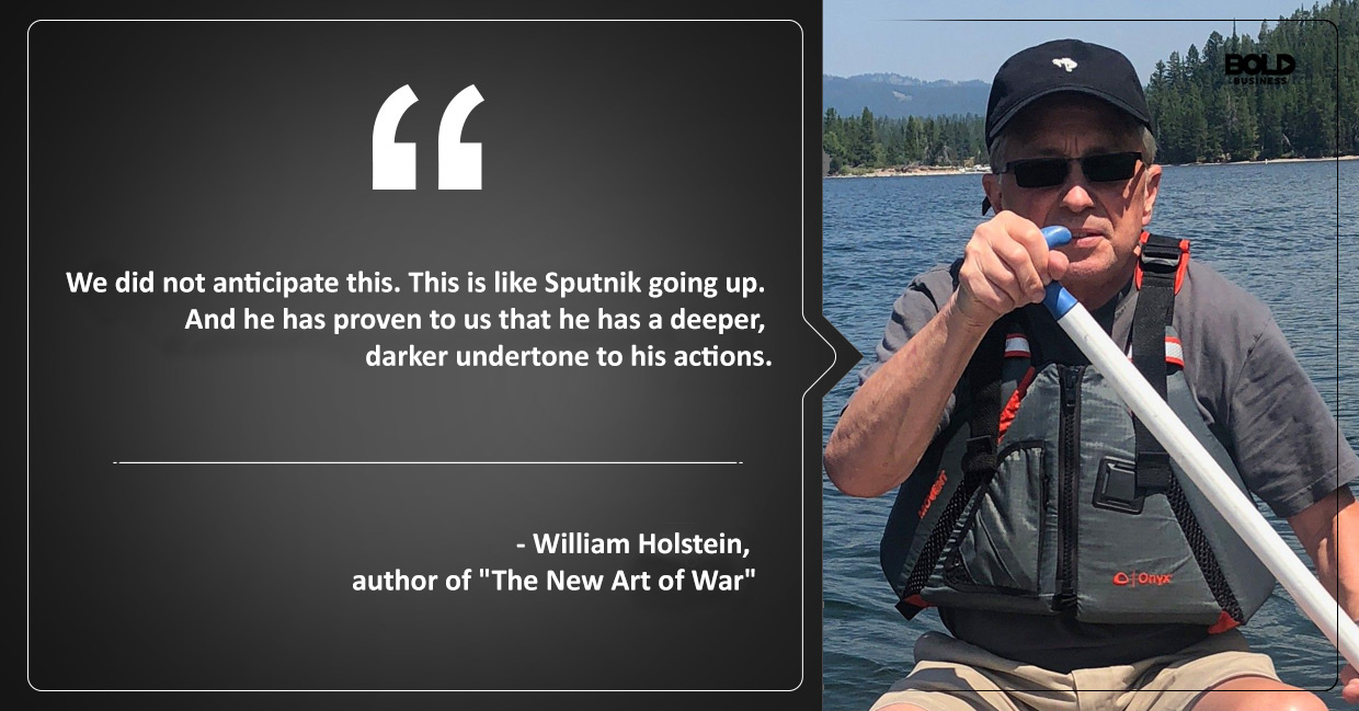 William Holstein canoeing on a lake