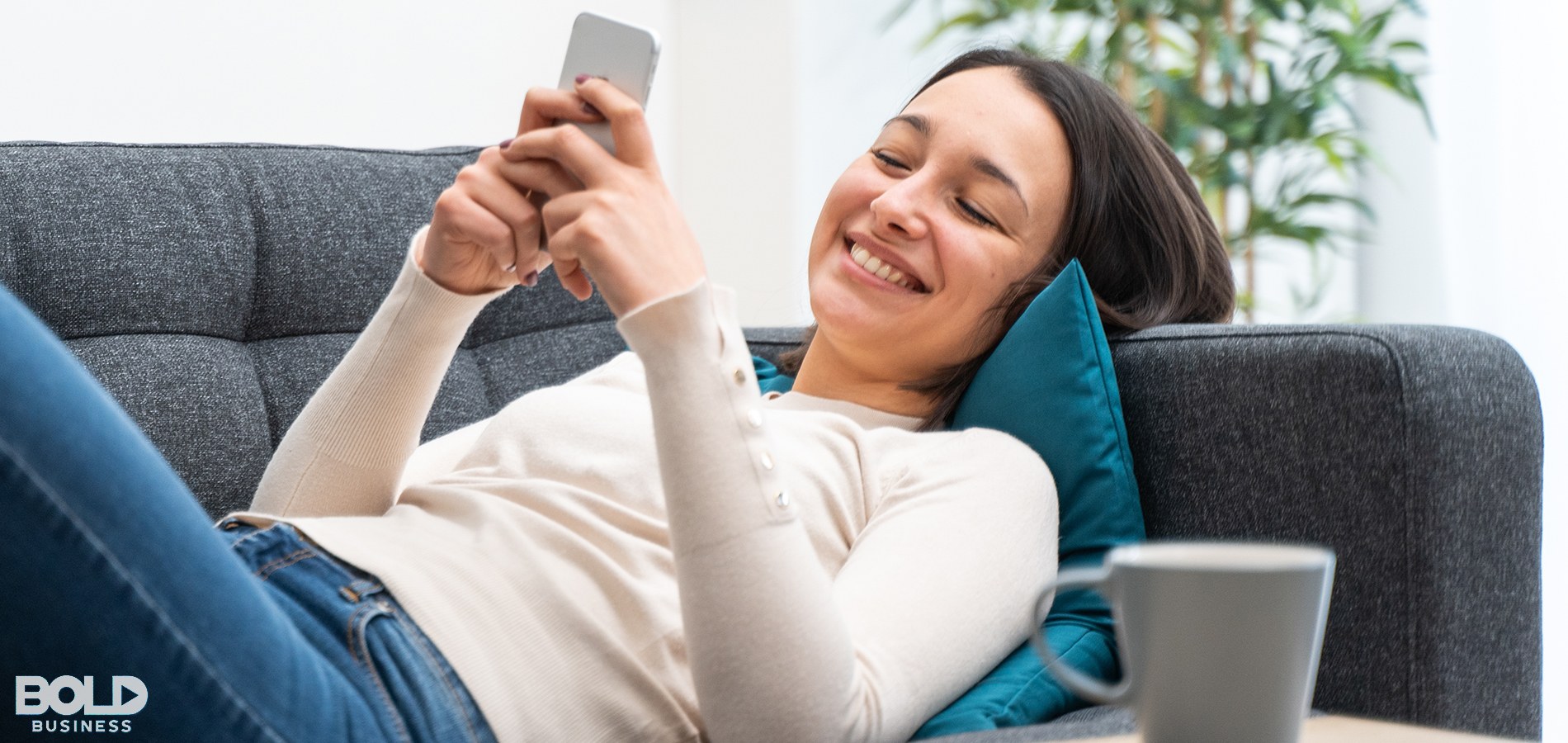 A woman on a couch chilling with her AI chatbot