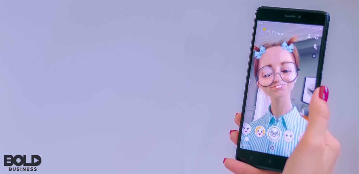 Someone talking to an AI chatbot on their phone