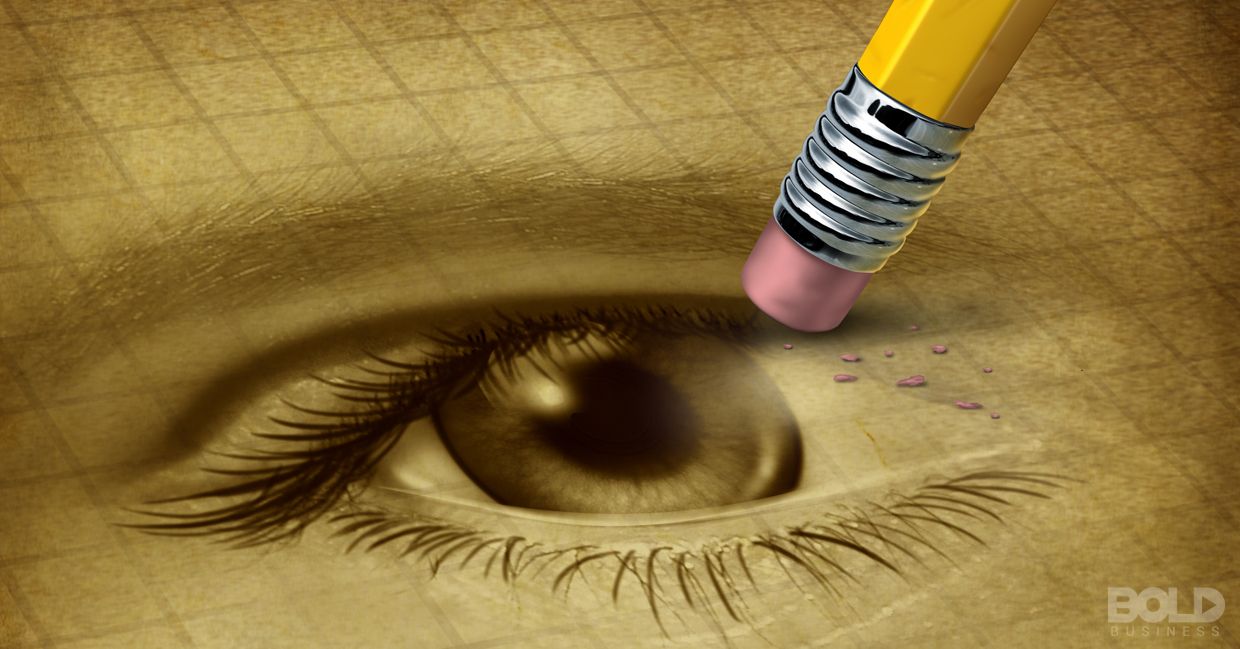 A pencil erasing a drawing of an eye