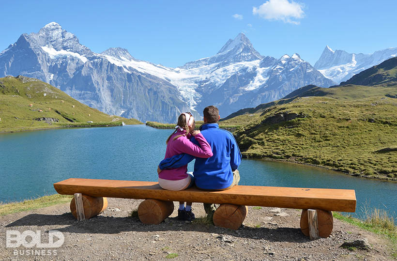 A couple on a bench in the middle of nowhere