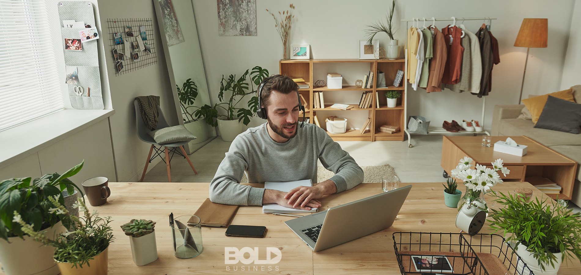 A dude working IT from his messy home