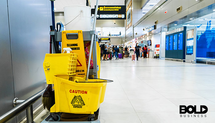 A mop and mop bucket at a sporting event