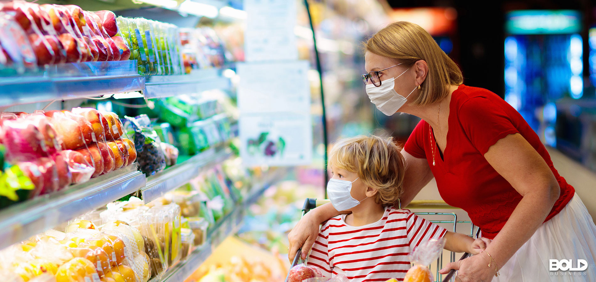 A mom and kid shopping for some delicious groceries