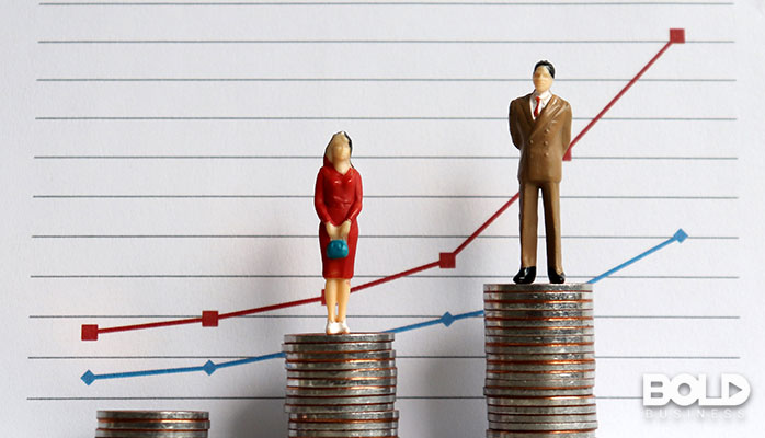 A graph with a woman and man standing on some coins