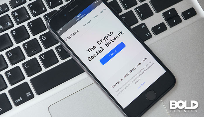 Someone trading cryptocurrency on their phone