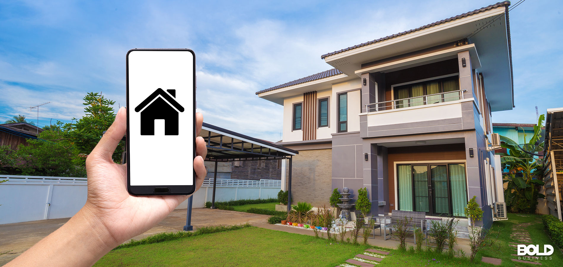 A person holding up a home improvement app to their home