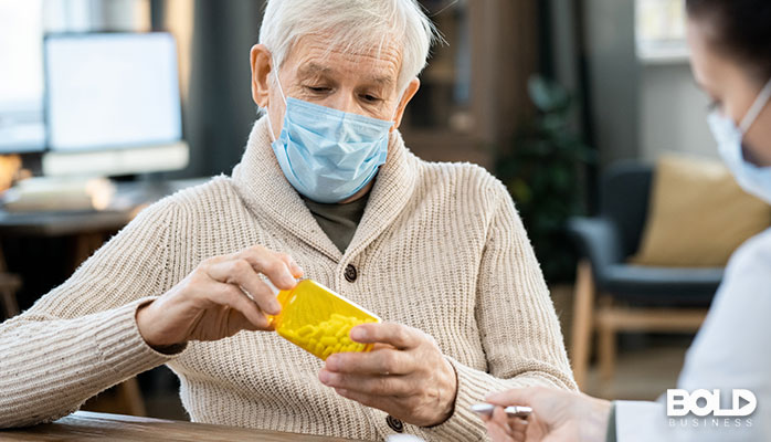 An old dude trying to open a child-proof pill bottle