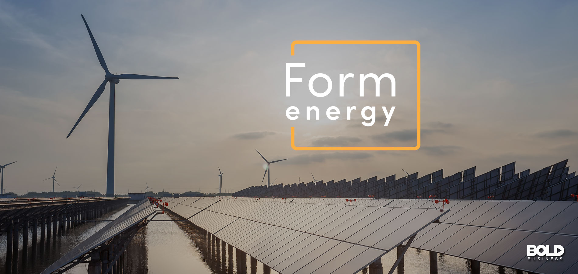 Solar panels and wind turbines, soaking up the sun