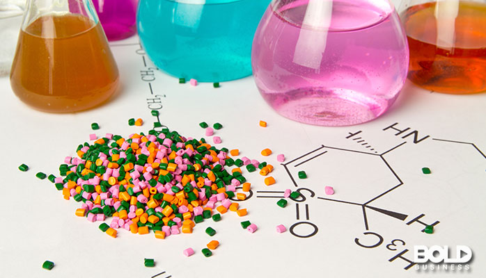 Some chemicals in beakers staring at molecules
