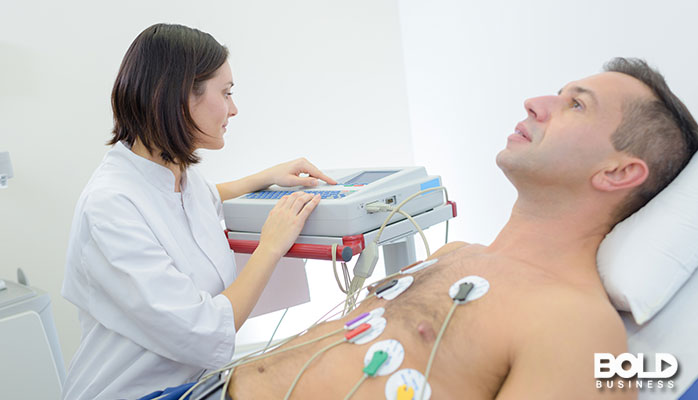 A medical professional doing something to some dude