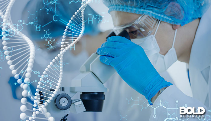 A scientist examining some giant DNA strands
