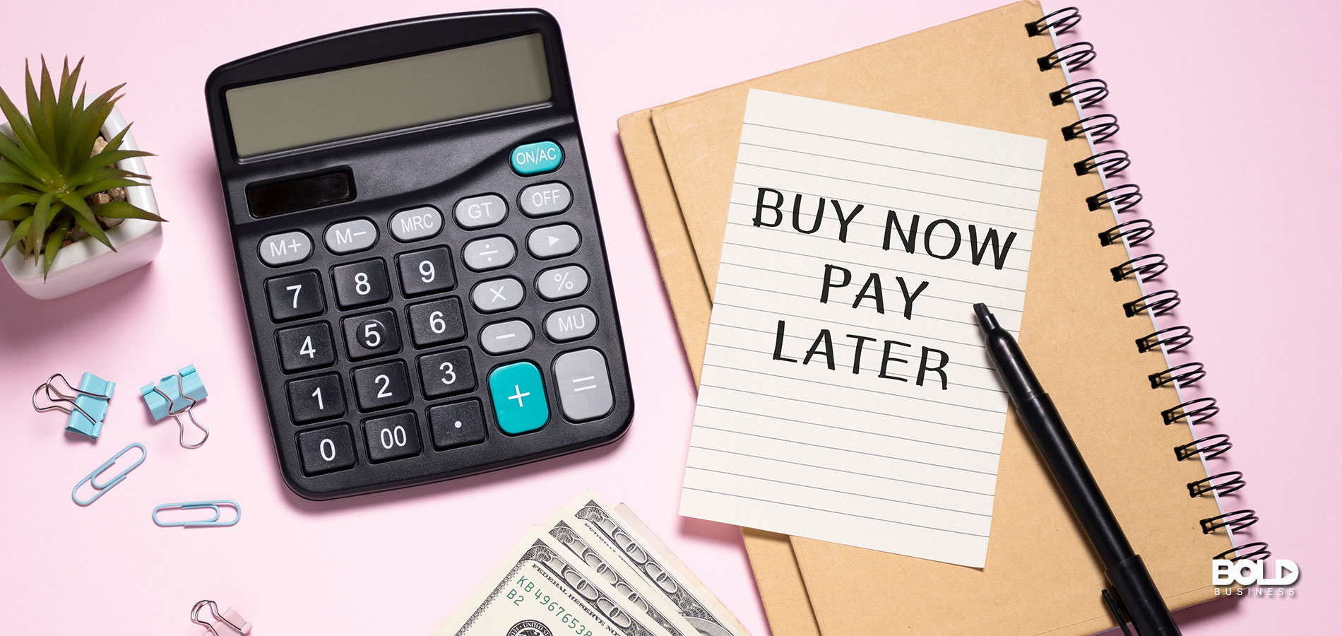 A person using a calculator to determine they're broke