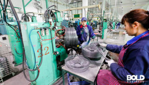 Some people working in a chip manufacturing factory