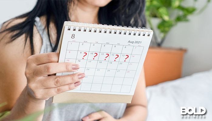 A woman using a calendar as a menopause product