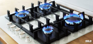 A gas stove burning despite natural gas health concerns