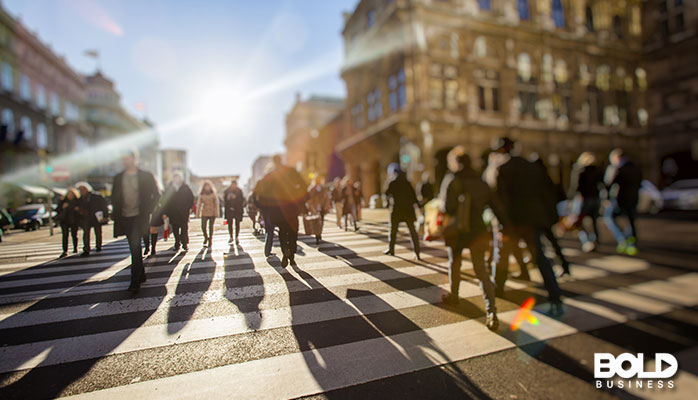 Some people in a crosswalk in NYC