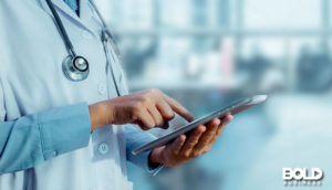 someone using healthcare data analytics solutions