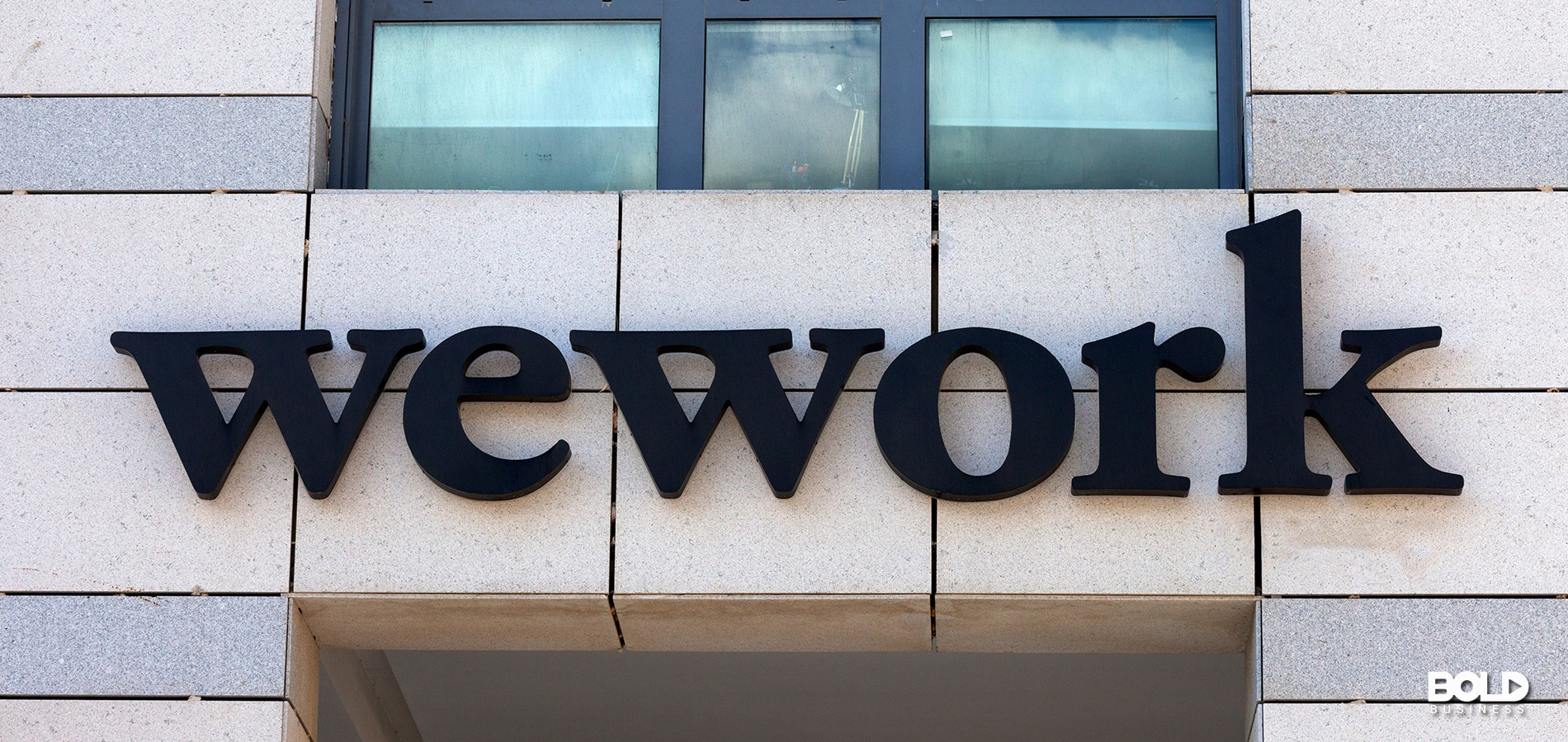 a WeWork sign on a building