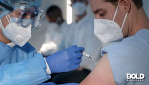 COVID-19 vaccine pioneers giving out shots