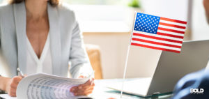 a woman thinking up solutions to the immigration crisis