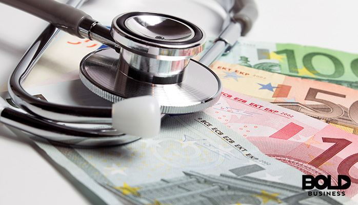 a stethoscope and some money