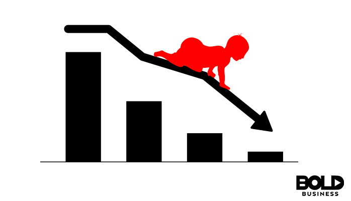 a child riding a graph arrow down
