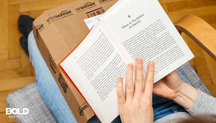 someone reading a real book, not a fake one