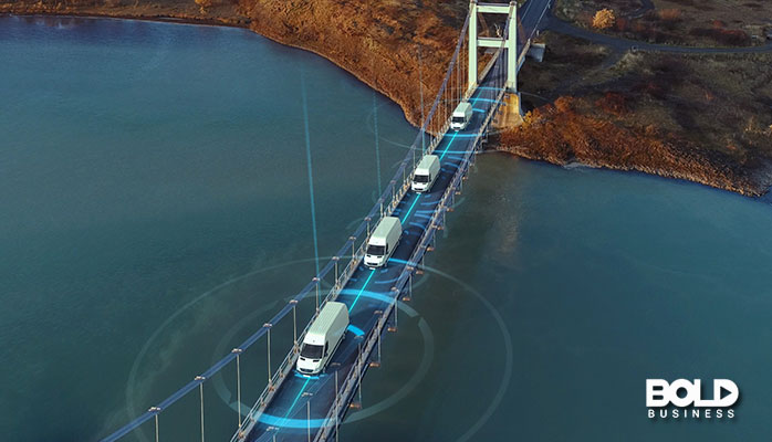 a bunch of autonomous trucks on a bridge