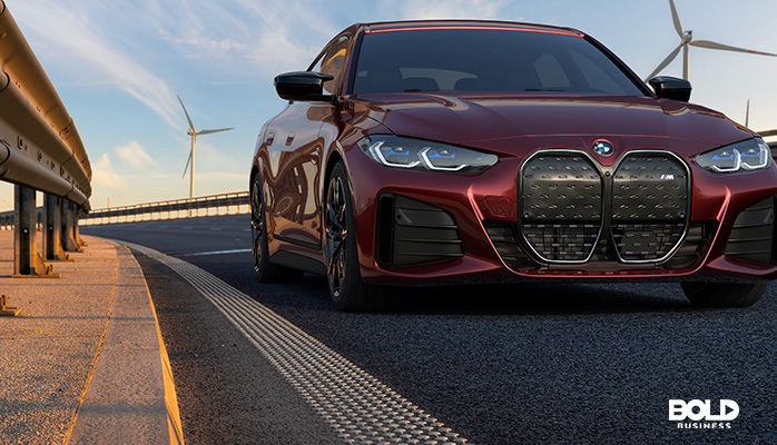 a red BMW cruising down the road