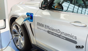 BMW EV sales as shown by a charging car