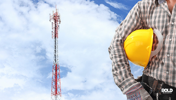 a dude holding a helmet