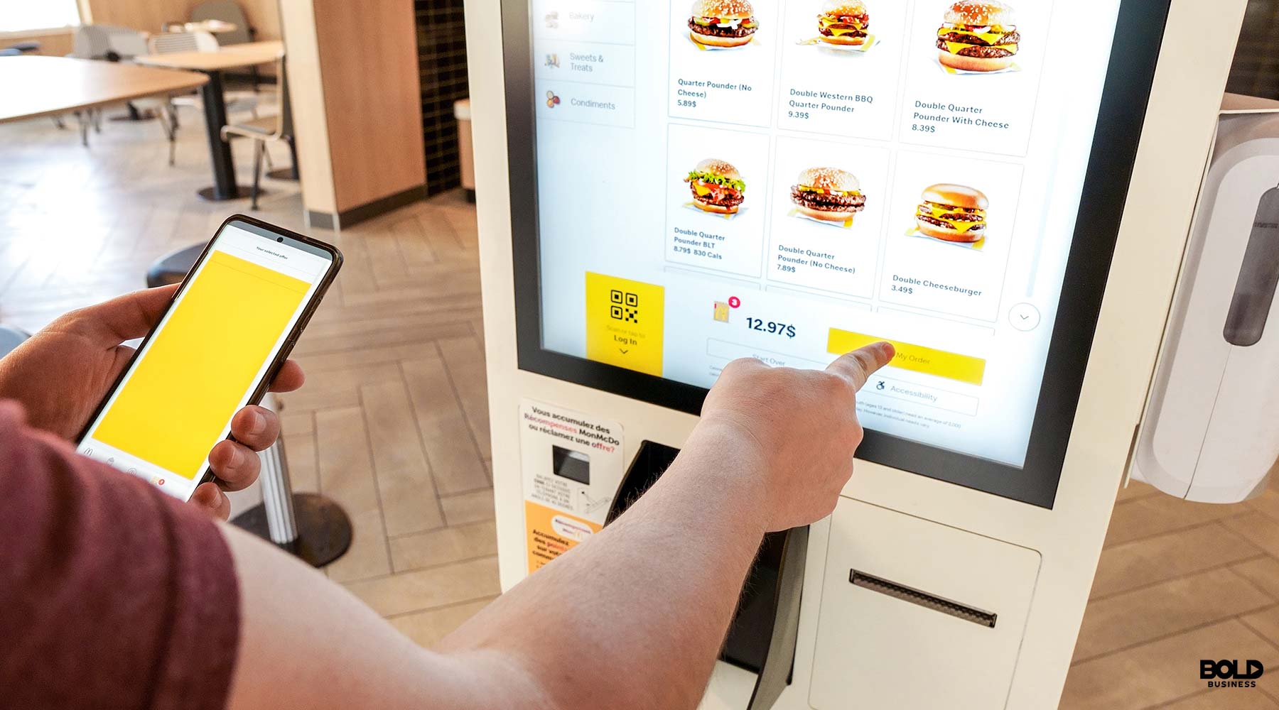 someone using a kiosk at McDonald's