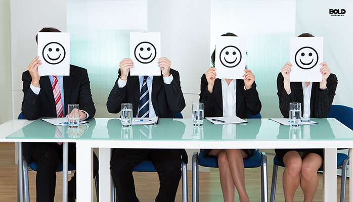 a bunch of people with smiley faces