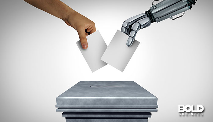 a human and a robot casting ballots