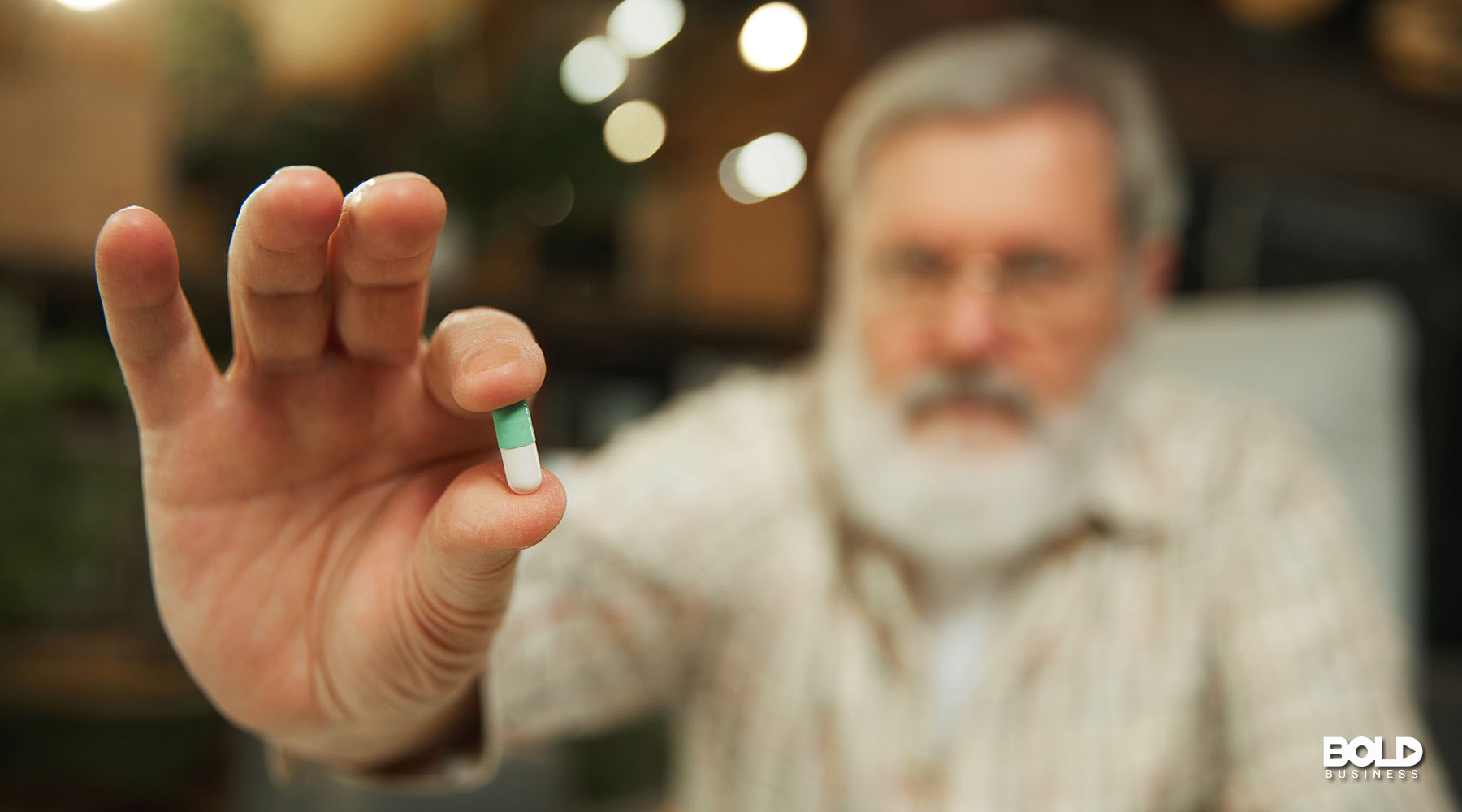 a dude about to take a longevity pill
