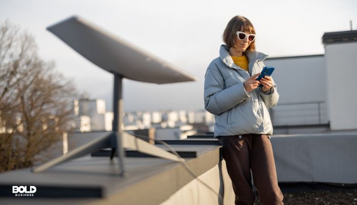 a woman using Starlink global connectivity