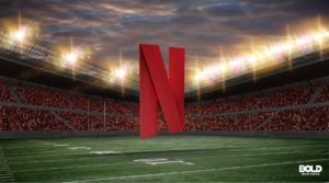 vibrant football stadium under evening lights with a large red Netflix 